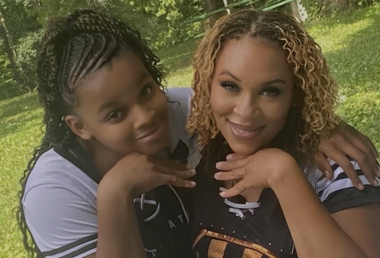 Tara with her son outdoors
